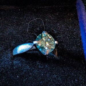 Medium teal 2 CT moissanite solitaire